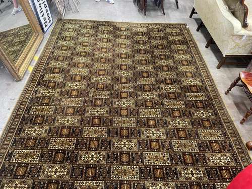 A Wilton machined mustard ground Persian style carpet, 364 x...