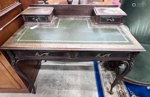 A late Victorian carved mahogany writing desk, length 99cm, ...