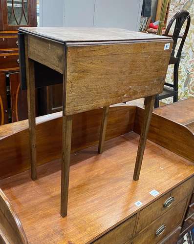 An early 19th century mahogany drop flap occasional table, w...