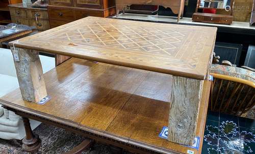 A rectangular parquetry coffee table, width 115cm, depth 89c...