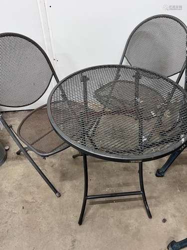 A Kettler circular garden table, diameter 62cm, height 72cm ...