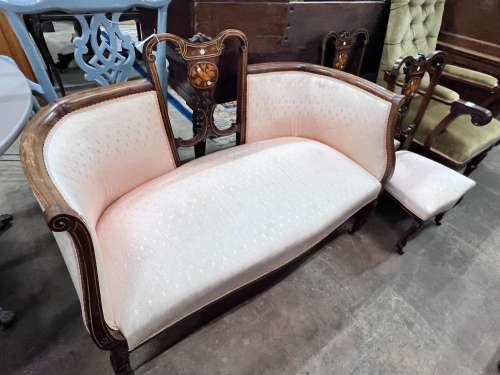 An Edwardian inlaid mahogany three piece salon suite, settee...