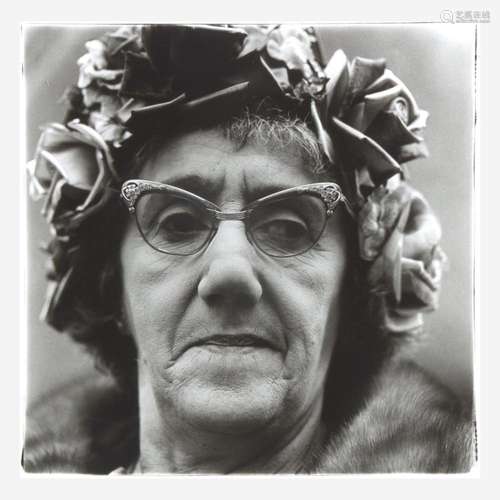 DIANE ARBUS (AMERICAN, 1923-1971) WOMAN IN A ROSE HAT, N.Y.C...