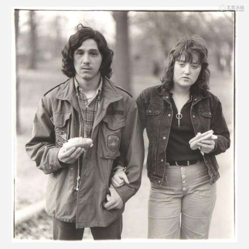 DIANE ARBUS (AMERICAN, 1923-1971) A YOUNG MAN AND HIS GIRLFR...