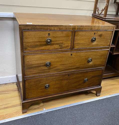 A small George IV mahogany chest of two short and two long d...