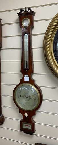 A Victorian mahogany wheel barometer marked Pensa & Son,...