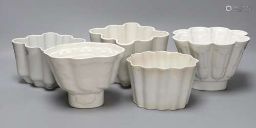 Five Victorian and later pottery jelly moulds, largest 12cm ...