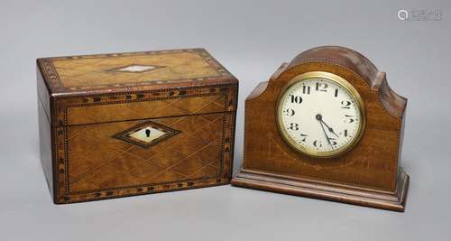 A Victorian walnut and marquetry tea caddy and an inlaid mah...