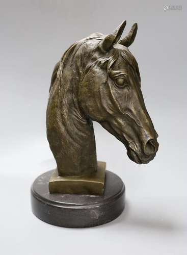 After Barye, a bronze of a horses head on plinth base, 32cm ...