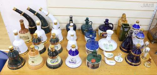 Four Wade commemorative porcelain 70cl bottles of Bells whis...