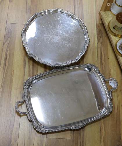 A large silver plated two handled tray and a similar salver,...