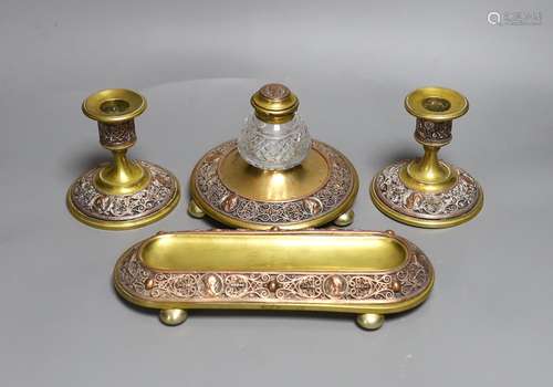 A brass and filigree worked copper desk set (4),inkwell 10.5...