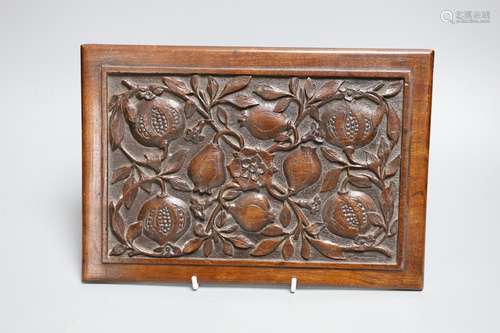 An Aesthetic period carved walnut ‘pomegranates’ panel, 28 c...