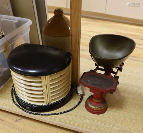 A 1930s HMV bakelite electric heater, A Mattocks cast iron w...