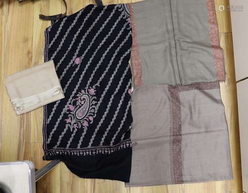 Four Indian wool and cashmere shawls, three silk embroidered...