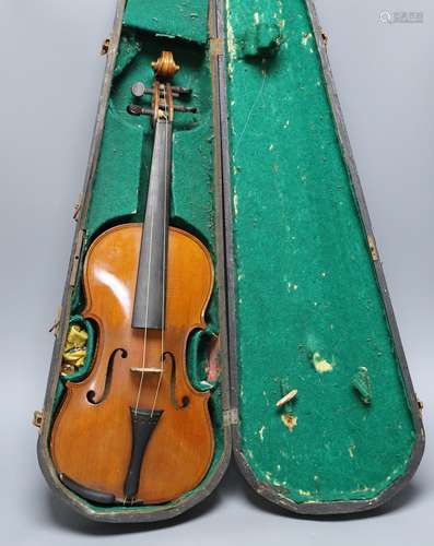 An early 20th century cased violin, length of back 36 cm