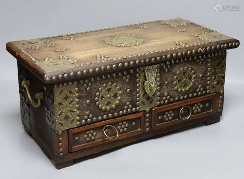 An Indian brass studded and mounted box, 45cms wide x 21cms ...