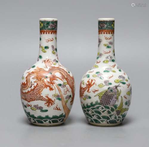 A pair of Chinese enamelled porcelain ‘dragon’ bottle vases,...