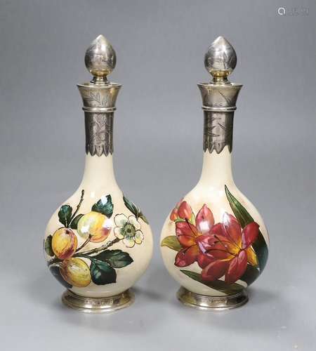 A pair of Victorian silver mounted Art pottery scent bottles...