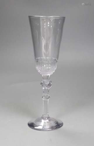 An 18th century facet stemmed ale glass,22.5cms high,