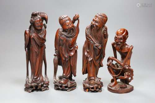 Four Chinese boxwood figures of a luohan and three immortals...