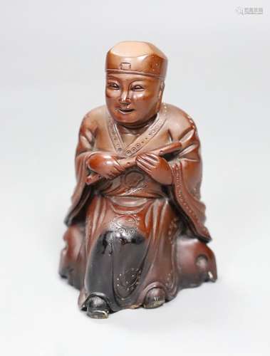 A Chinese composition figure of a seated musician, 12cms hig...