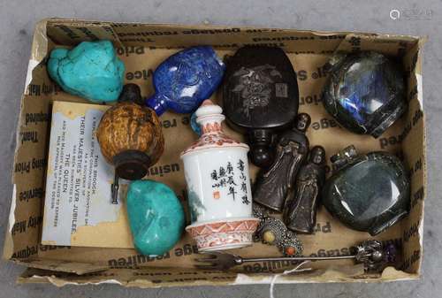 A collection of Chinese hardstone, wood or porcelain snuff b...