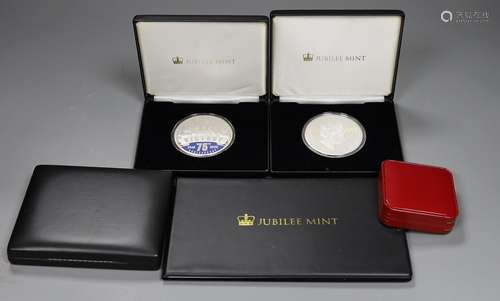 Five assorted silver proof sets.