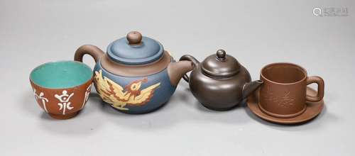 A 19th century Chinese Yixing cup, two later teapots and a c...