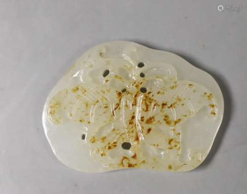 A Chinese white and russet skin jade ‘butterfly’ plaque,3,5 ...