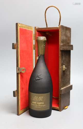 A bottle of Remy Martin 1724-1974 Grande Fine Champagne Cogn...