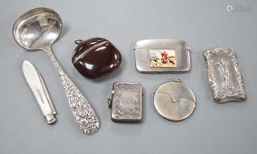 Four assorted early 20th century silver vesta cases, includi...