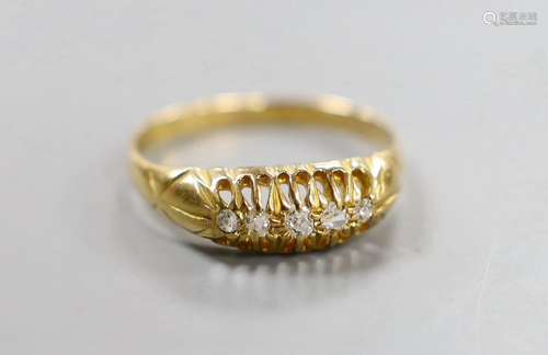 An early 20th century 18ct gold and graduated five stone dia...