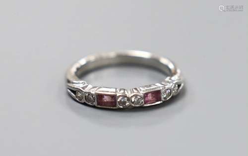 A modern platinum, two stone pink sapphire and six stone dia...