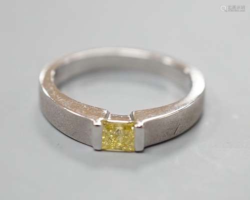 A modern sandblasted platinum and solitaire rectangular cut ...