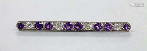 A white metal, eight stone amethyst and four stone diamond s...