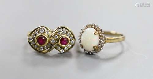 A modern yellow metal ruby? and diamond set double cluster r...