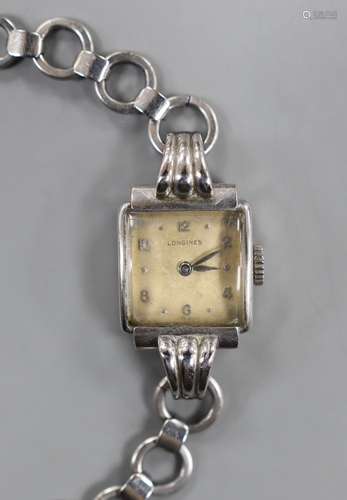 A ladys stainless steel Longines manual wind wrist watch, wi...