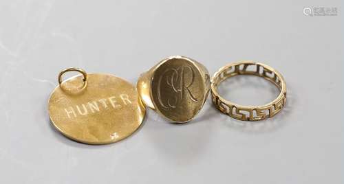 A 9ct gold signet ring, a yellow metal Greek Key band and a ...