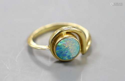 A modern 18ct gold and white opal set ring, size R, gross we...