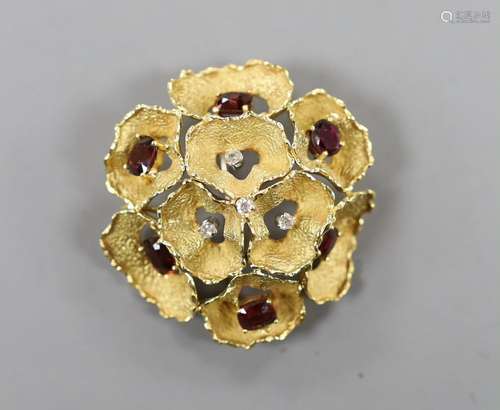 A 1960s textured 18ct gold, garnet and diamond cluster set o...