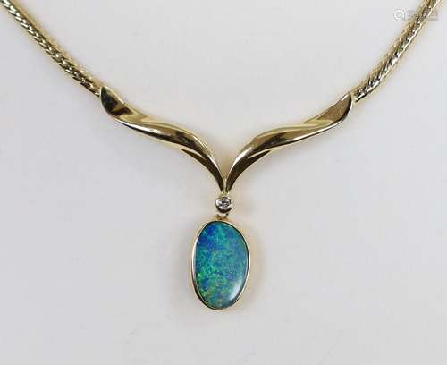 A modern 585 yellow metal and black opal doublet? and diamon...