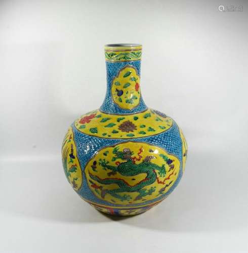 Colorful carved porcelain dragon and phoenix jar