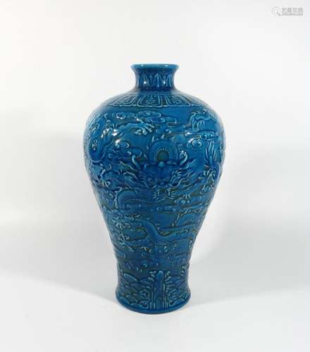 Orchid glaze carved dragon bottle