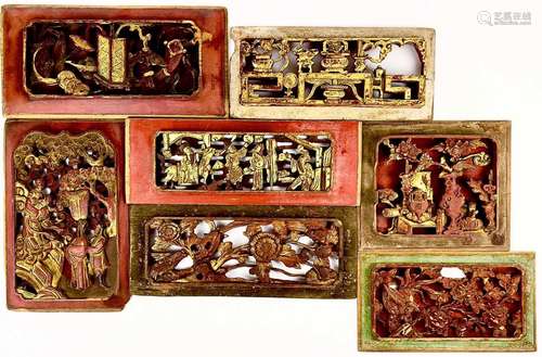 Seven Chinese carved wood gilt and red painted panels, early...