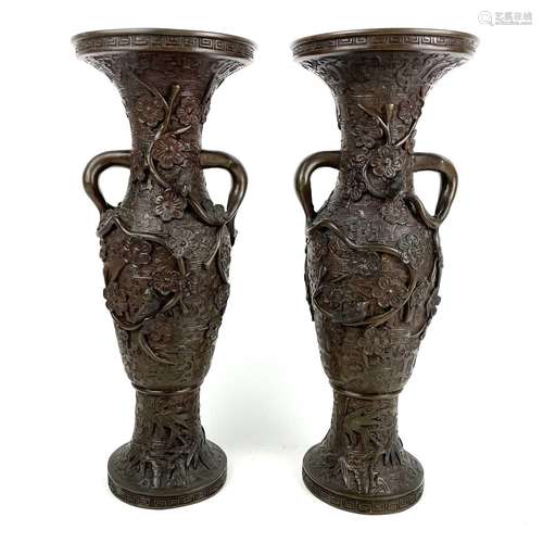 A pair of Japanese bronze vases, late 19th/early 20th centur...