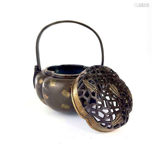 A Chinese bronze hand warmer / portable incense burner, 19th...