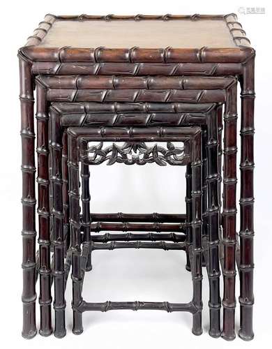 A Chinese hardwood quartetto nest of tables, early 20th cent...