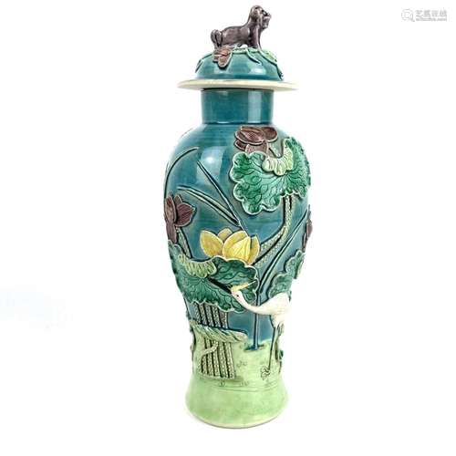 A Chinese sancai glazed porcelain baluster vase and cover, l...