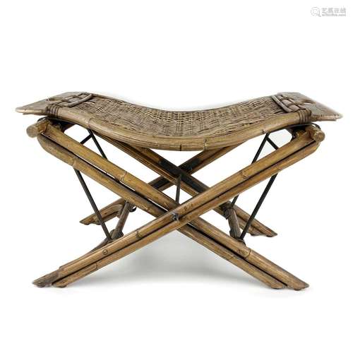 A Chinese bamboo and softwood folding campaign stool, late 1...